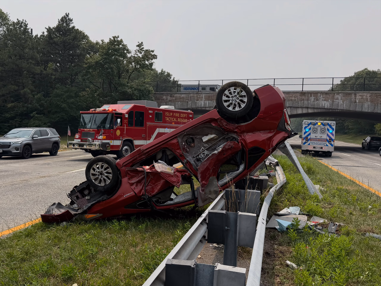 Toyota Sedan Rolls Over Guardrail, Lands on Roof in Center Median of Southern State Parkway Near Exit 41A in West Islip
