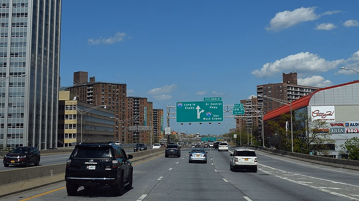 Coach Bus Flips Over Median on LIE Near Greenpoint Ave Exit, Killing Two and Injuring 20